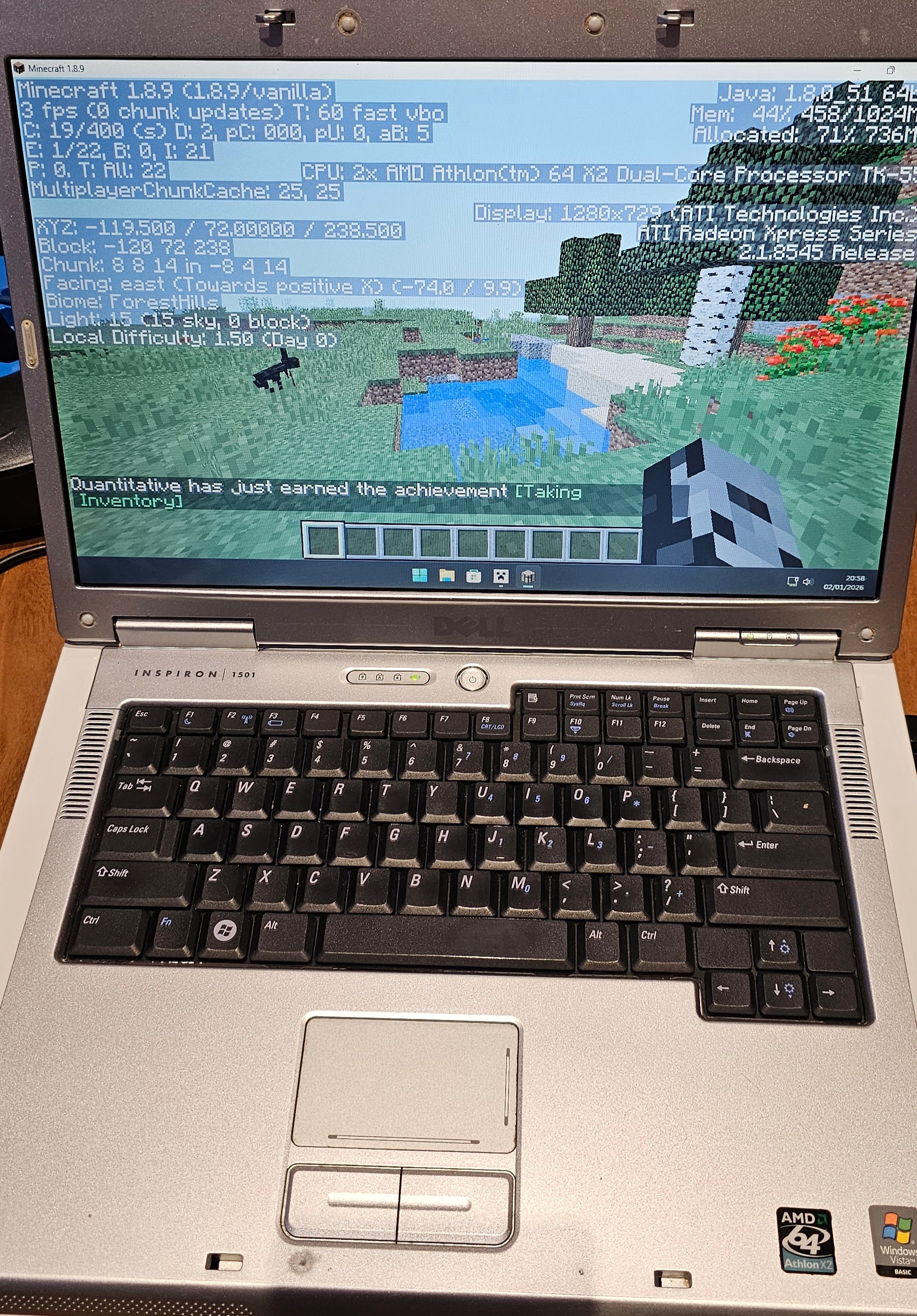 Dell Inspiron 1501 running Minecraft 1.8.9 with debug overlay showing Athlon 64 X2 and ATI Radeon Xpress